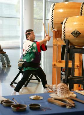 Johnny Mori of Kinnara Taiko performs on a drum